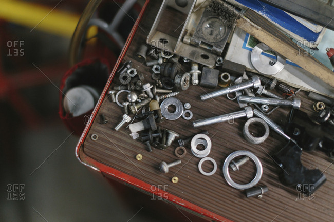 Close-up of work tools on table in auto repair shop