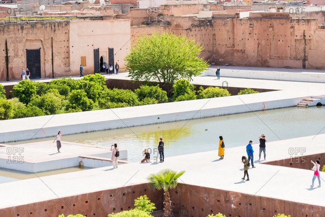December 1, 2014: Tourists at The El Badi Palace in Marrakech Morocco