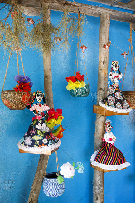 Festive Sugar Skull Decorations Hanging In Vibrant Setting Stock