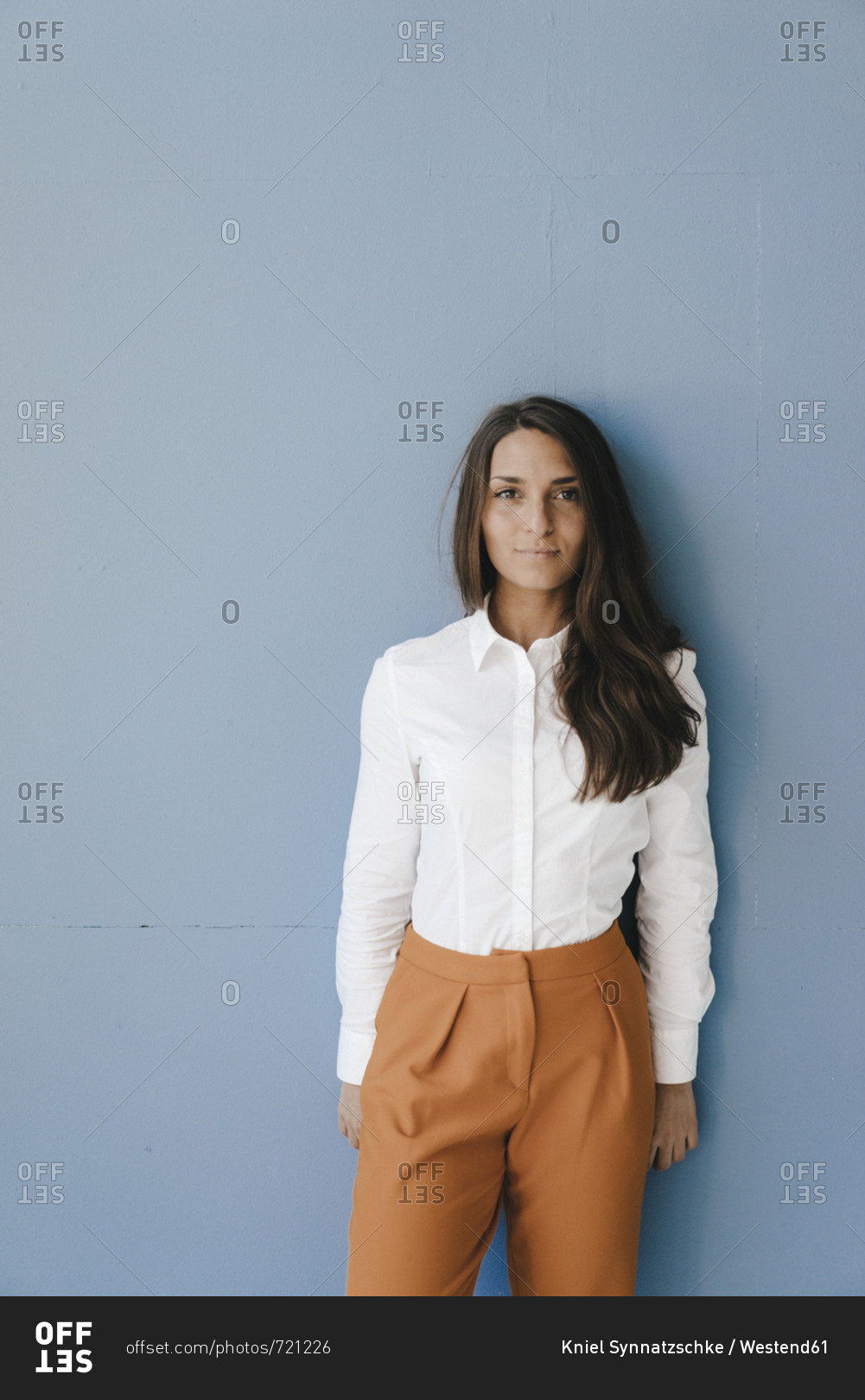 Portrait of a pretty clever young woman stock photo OFFSET