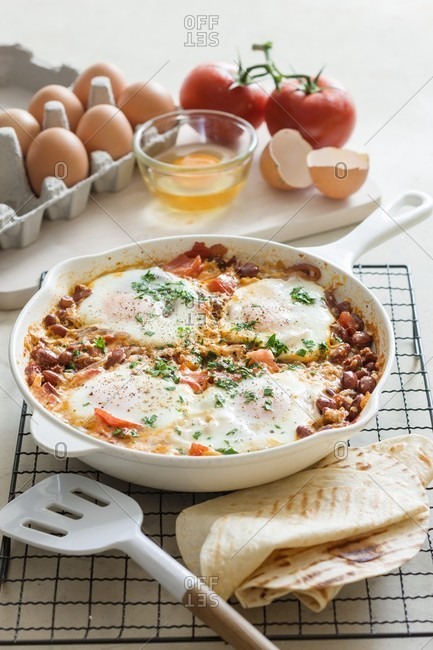Tomato and bean stew with chorizo and fried eggs