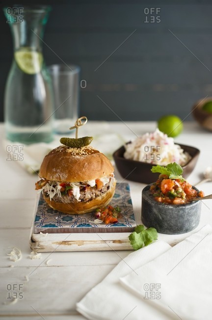 Moroccan lamb burger with mint yoghurt, coleslaw and spicy tomato relish