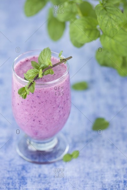 Pink berry smoothie with fresh mint