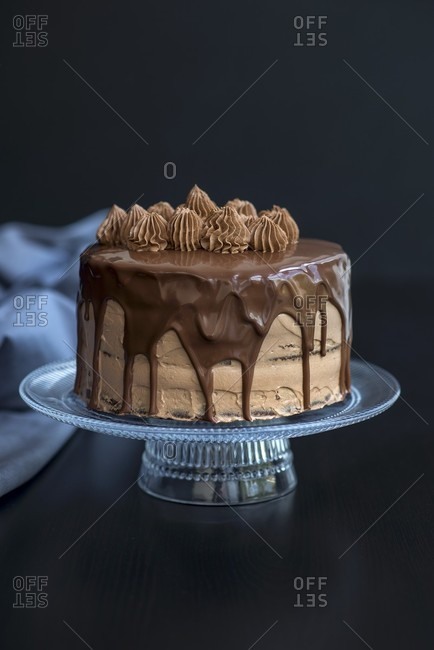 Chocolate cake with a chocolate spread filling and a chocolate fudge glaze