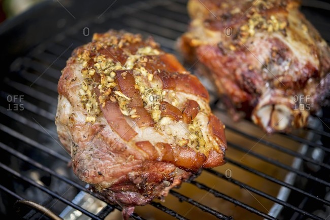 Crispy roast pork on a grill