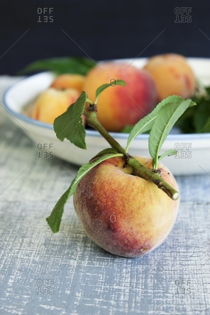 Peaches with leaves