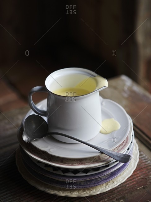 A jug of vanilla sauce