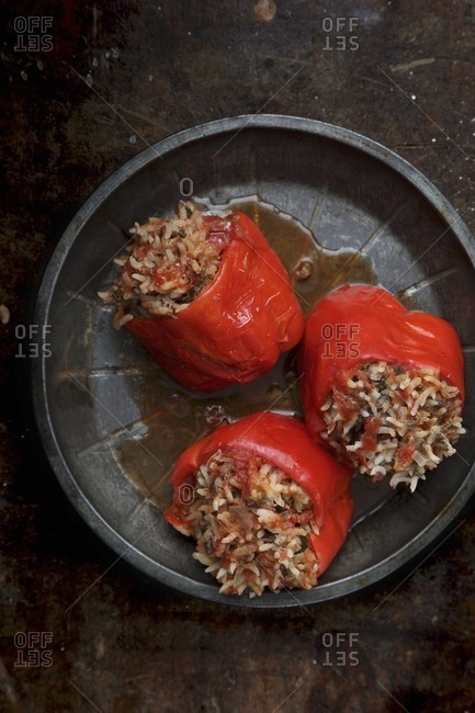 Red peppers filled with rice and minced meat in tomato sauce