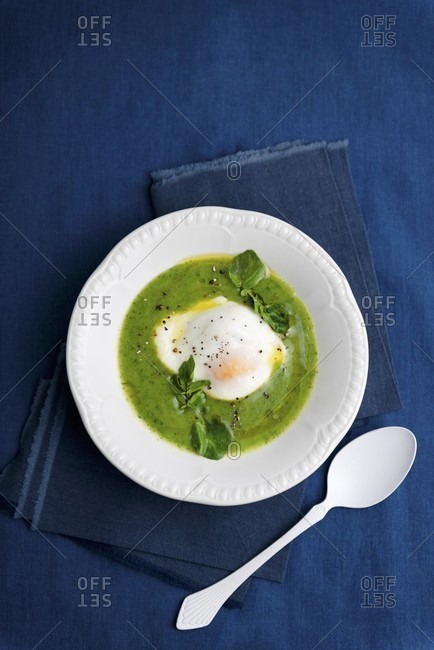 Watercress soup with a poached egg