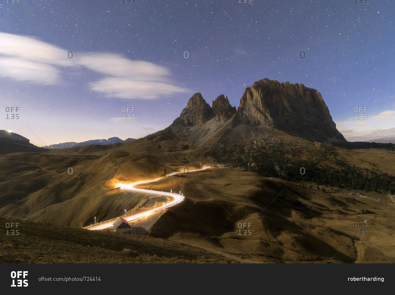 Lights of car trails with Sassopiatto in the background, Dolomites, South Tyrol, Italy, Europe