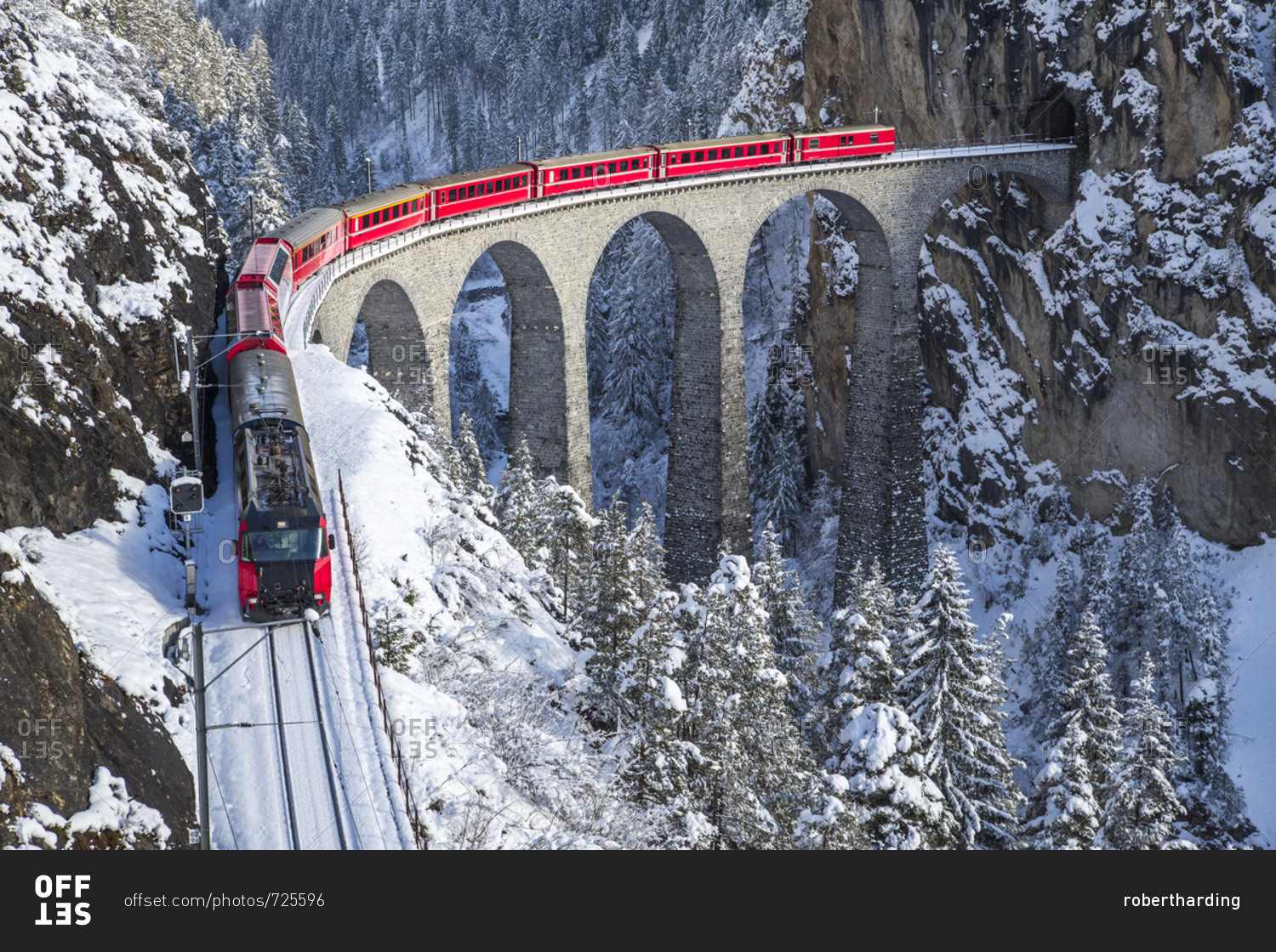The red train of the Albula-Bernina Express Railway, UNESCO World Heritage on the Landwasser Viaduct, Switzerland, Europe