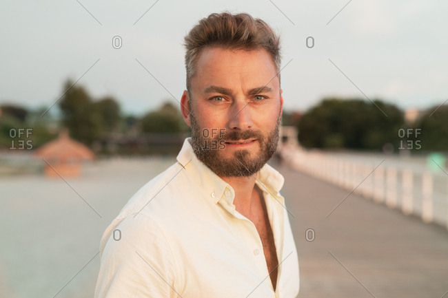 Man with facial hair on boardwalk