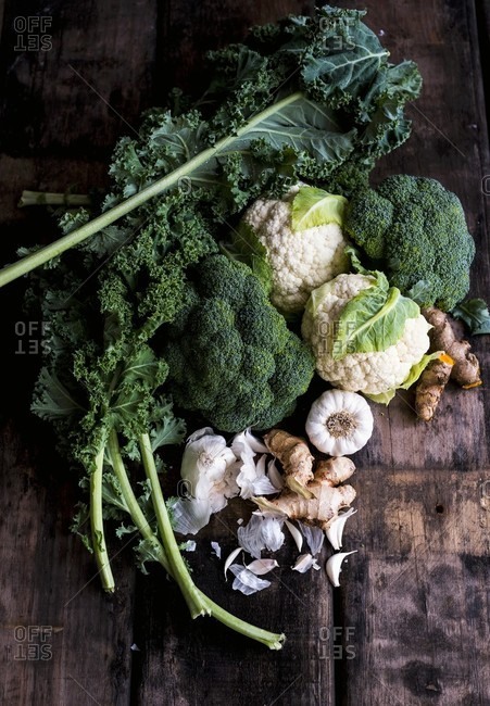 Various types of kale with garlic, turmeric and ginger (ingredients for kale soup)