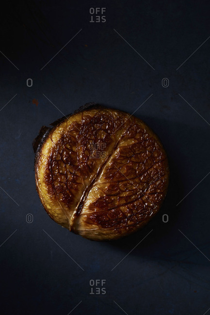 Cabbage bread on black surface