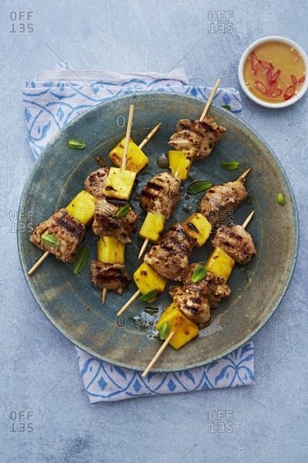 Grilled pork and mango kebabs with chilli sauce
