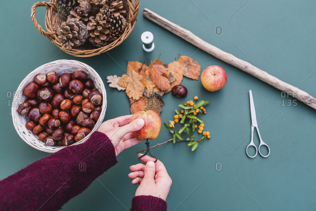 DIY, autumnal decoration, mobile, natural materials, crafting, women's hands, detail,
