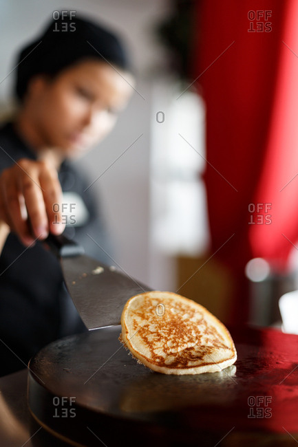 Chef flipping a pancake