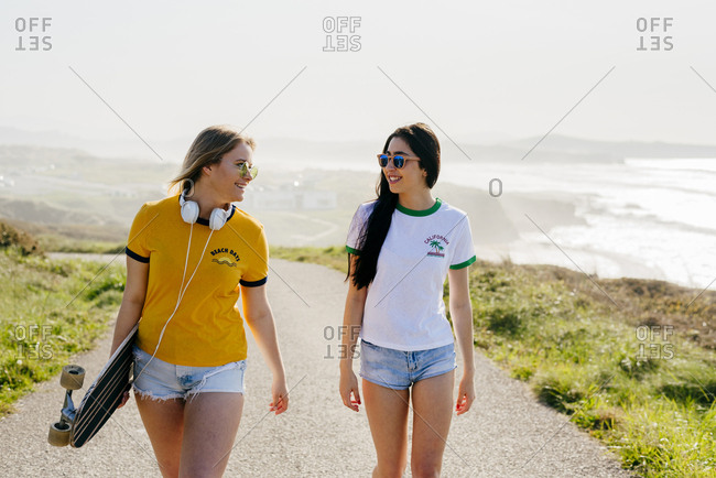 Stylish confident girls in summertime