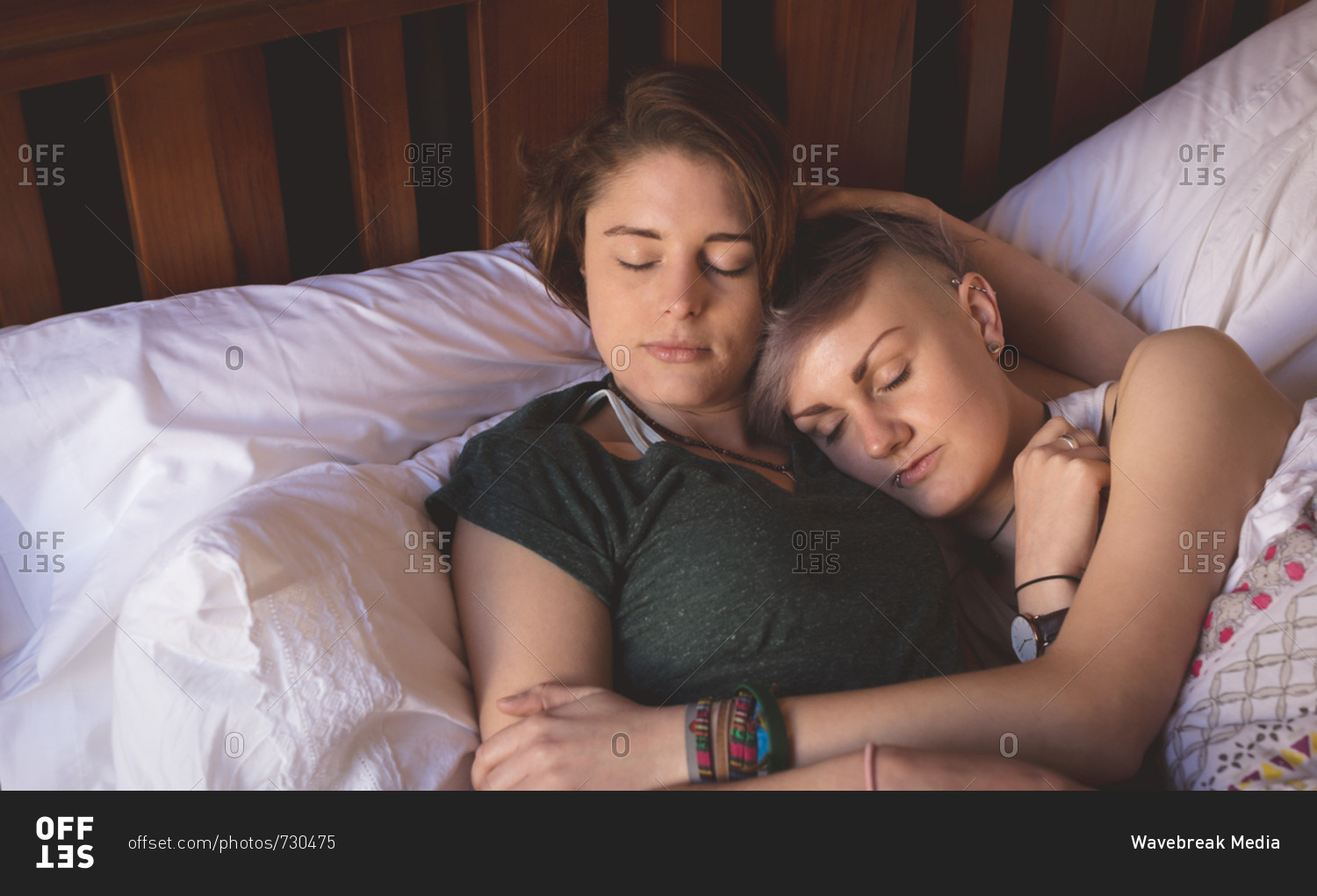 Lesbian Couple Sleeping On Bed In Bedroom At Home St
