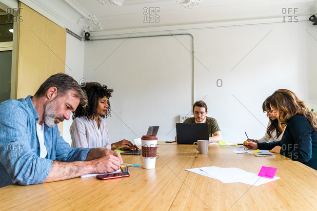 Colleagues discussing graphs