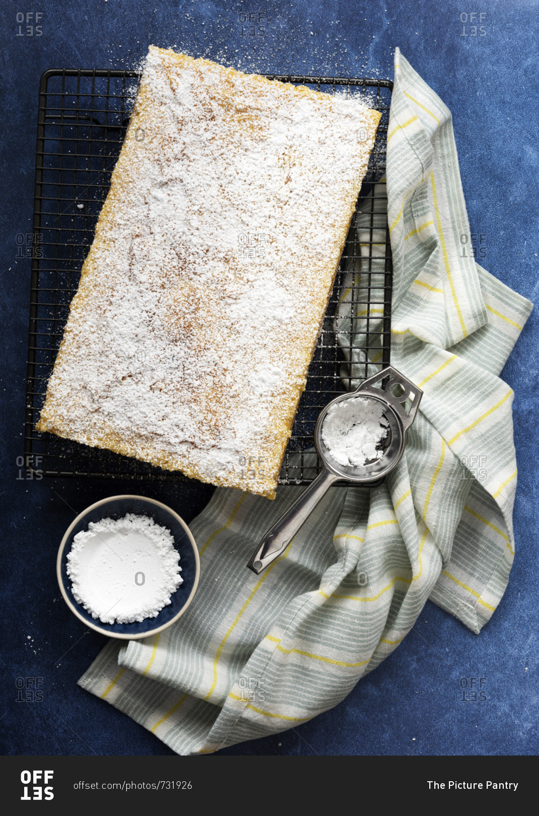 Homemade lemon slice covered with sifted icing powder