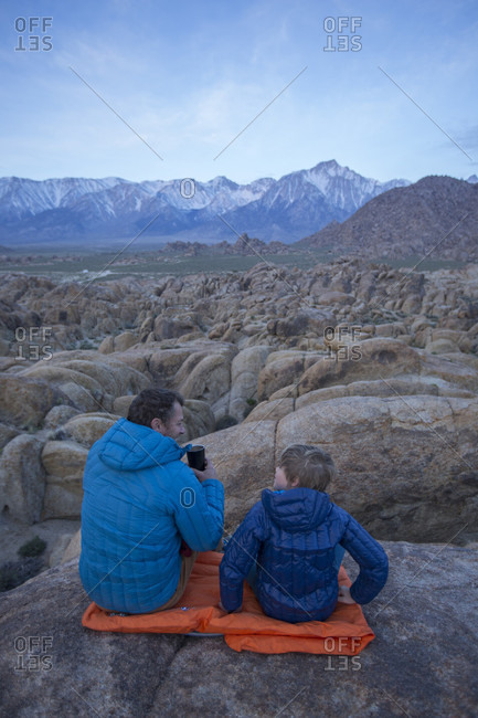 Father and son and Sierra Nevada Mountains, Alabama Hills Recreation Area, Lone Pine, California, USA