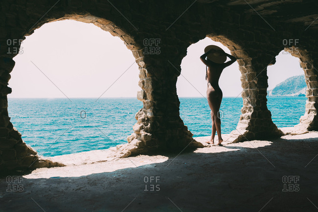 Black Sea Beach Nude - Naked black woman contemplating the sea view stock photo ...
