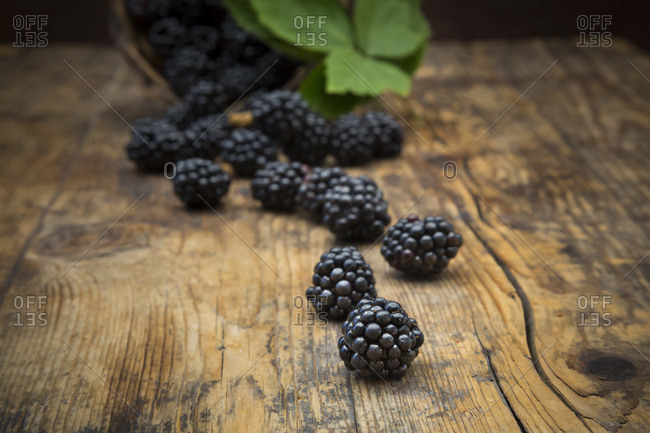 Organic blackberries on wood