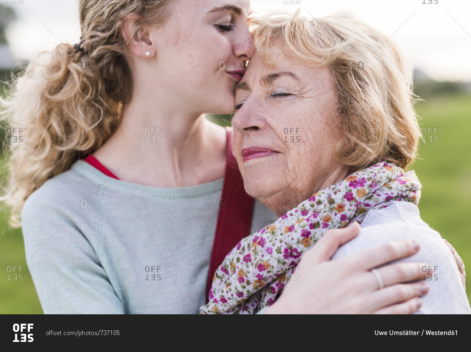 Granddaughter Kissing Her Grandmother Offset Stock Photo OFFSET.