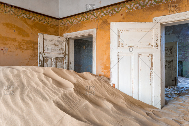 The interior of a building in the abandoned diamond mining ghost town of Kolmanskop, Namibia, Africa