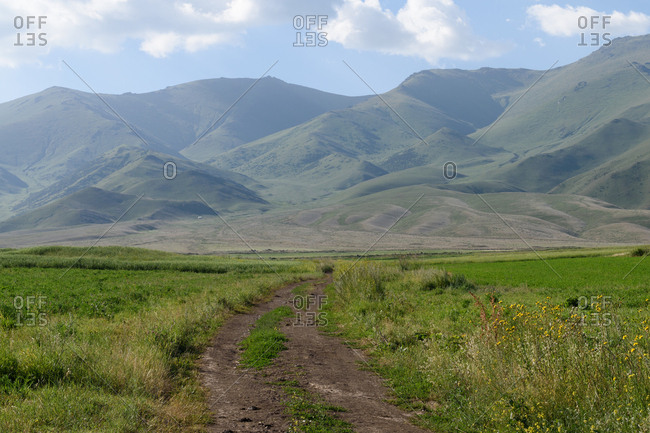 Path leading to mountains in Kyrgyzstan, Asia