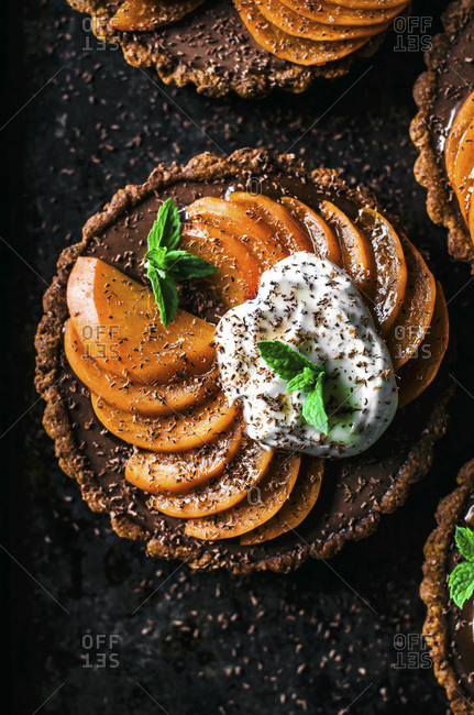 Chocolate ganache apricot tarts with almond oat pastry