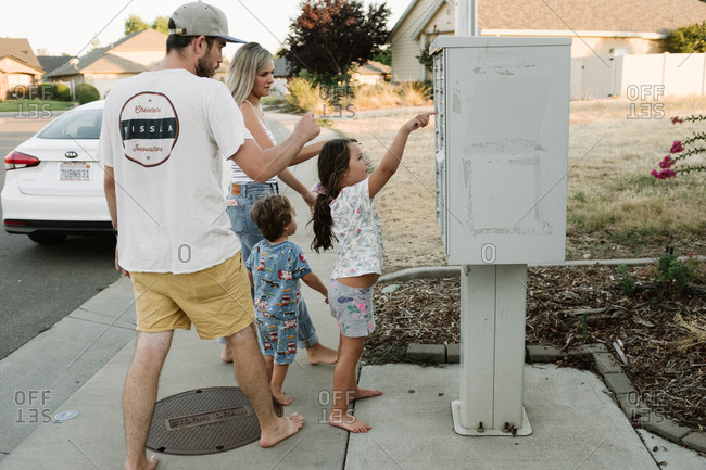 California, USA - July 15, 2018: Family getting the mail