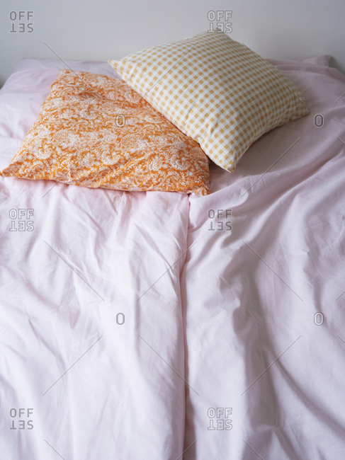 August 18, 2010: Bed with two throw pillows
