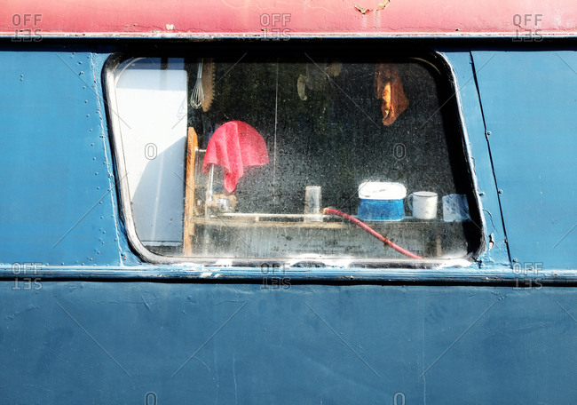 Looking through a dirty window in a bus