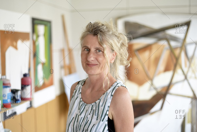 Female painter in her atelier- portrait