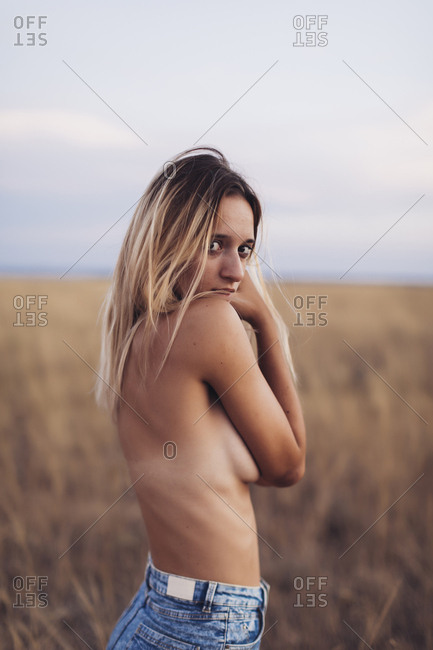 Young woman with nude shoulders by daniel_dash