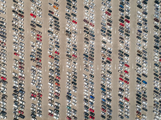 Aerial abstract view of cars parked outside Motiongate theme park, Dubai, UAE.
