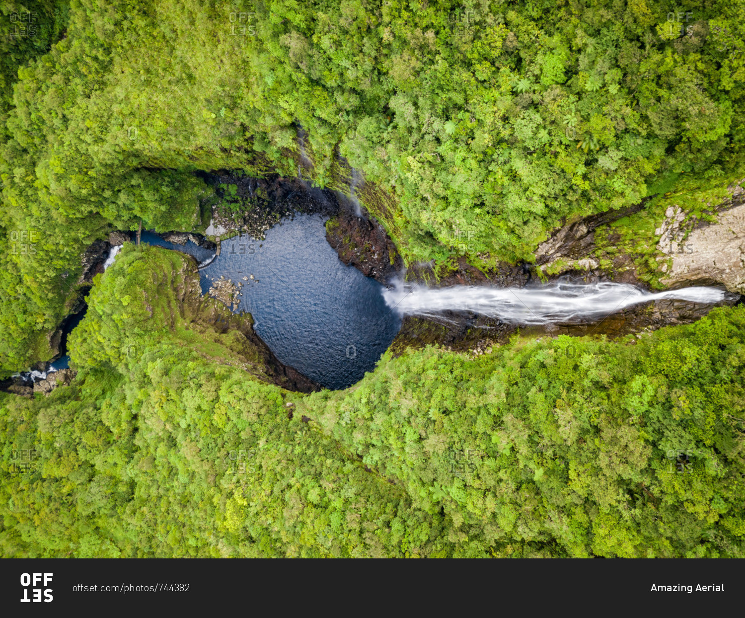 Aerial view of waterfall in Foret Departementale du Cratere, Reunion.