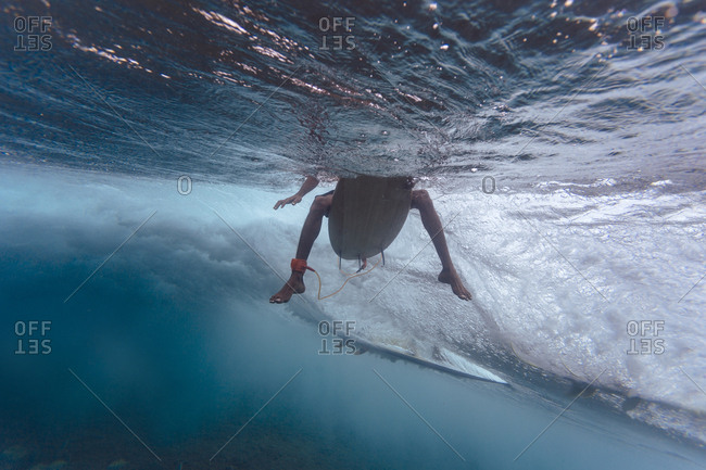 Maldives Indian Ocean Surfer Sitting On Surfboard