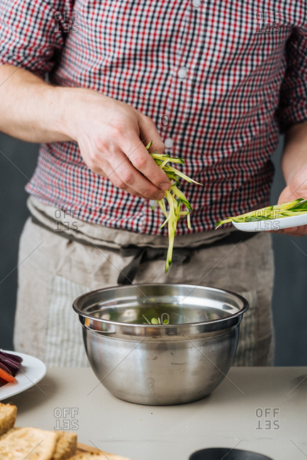 Chef diced vegetables in a bowl