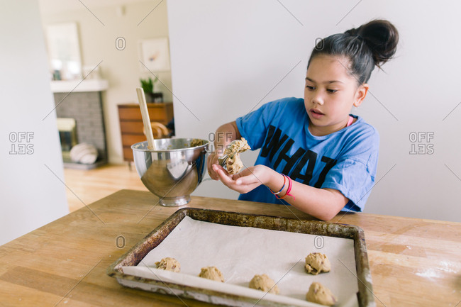 Girl making homemade chocolate chip cookies