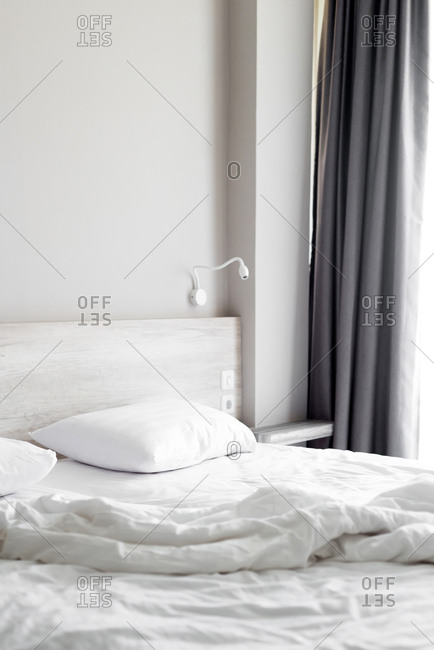 Messy Empty Bed in a room