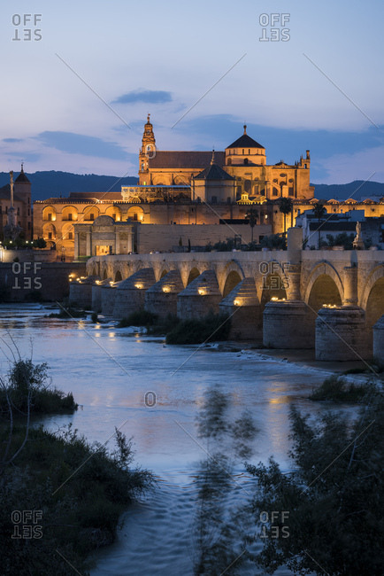 The Cathedral and Great Mosque of Cordoba (Mezquita) and Roman Bridge at twilight, UNESCO World Heritage Site, Cordoba, Andalucia, Spain, Europe