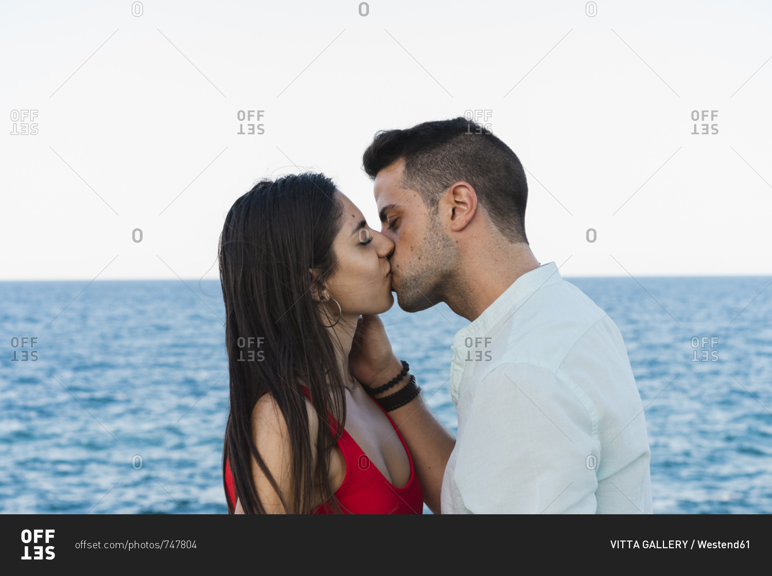 Young urban couple falling in love- kissing