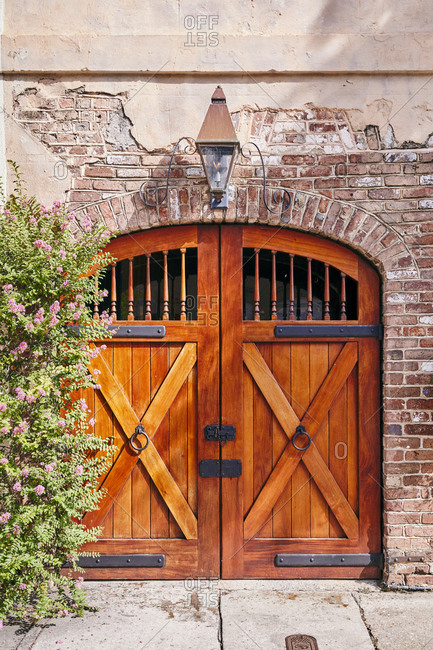Wooden French doors on old building in Charleston, South Carolina
