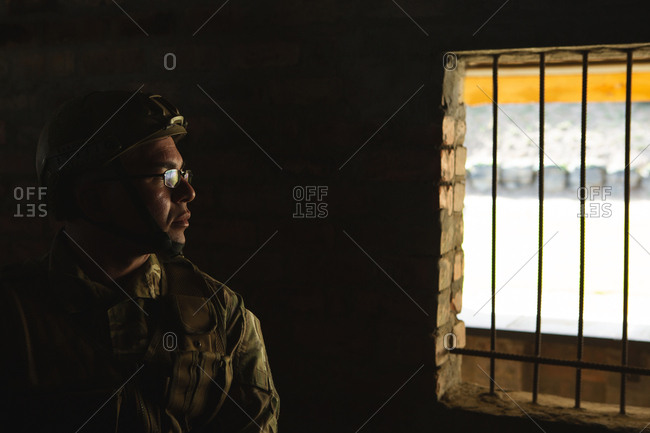 Thoughtful military solider standing in military training
