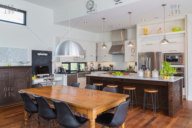 open plan kitchen with dining table