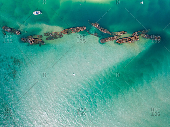 Aerial view of yachts and Tangalooma shipwrecks in Moreton Bay, Australia