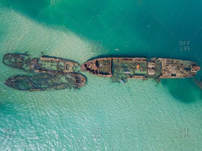 Aerial view of kayak and Tangalooma shipwrecks in Moreton Bay, Australia